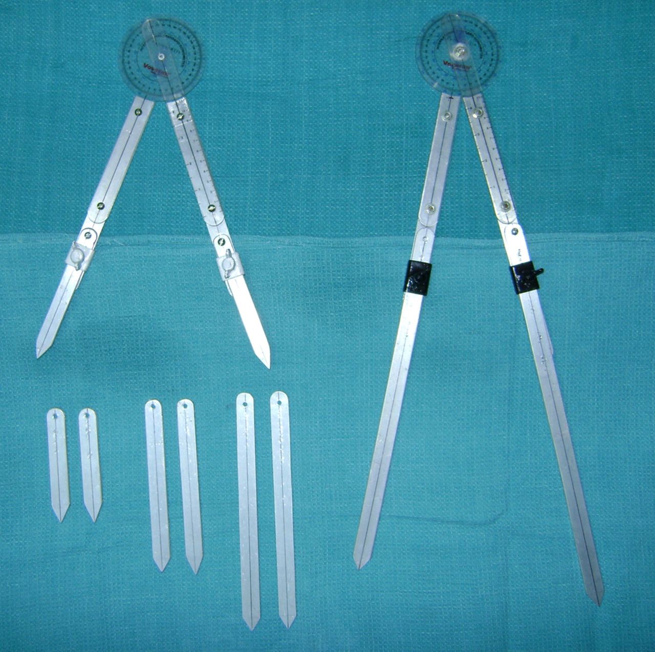 Fig. 3 
          Photograph showing the customised standardised
goniometers with expandable arms.
        