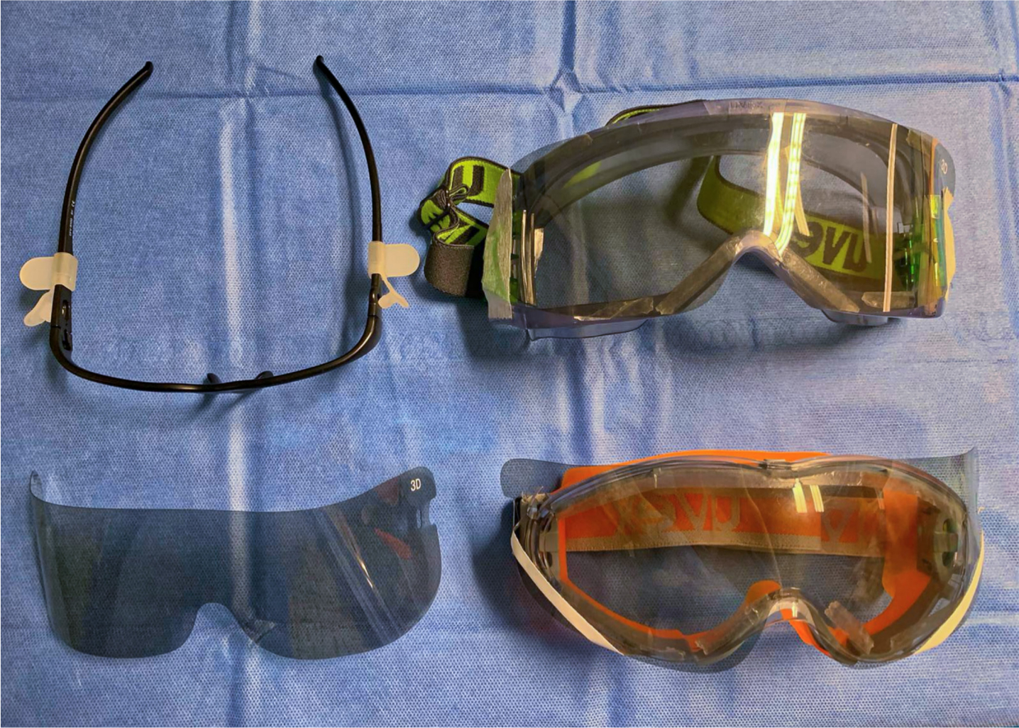 Fig. 2 
        Original 3D glasses with lens removed (left). Protective goggles with 3D lens attached (right).
      