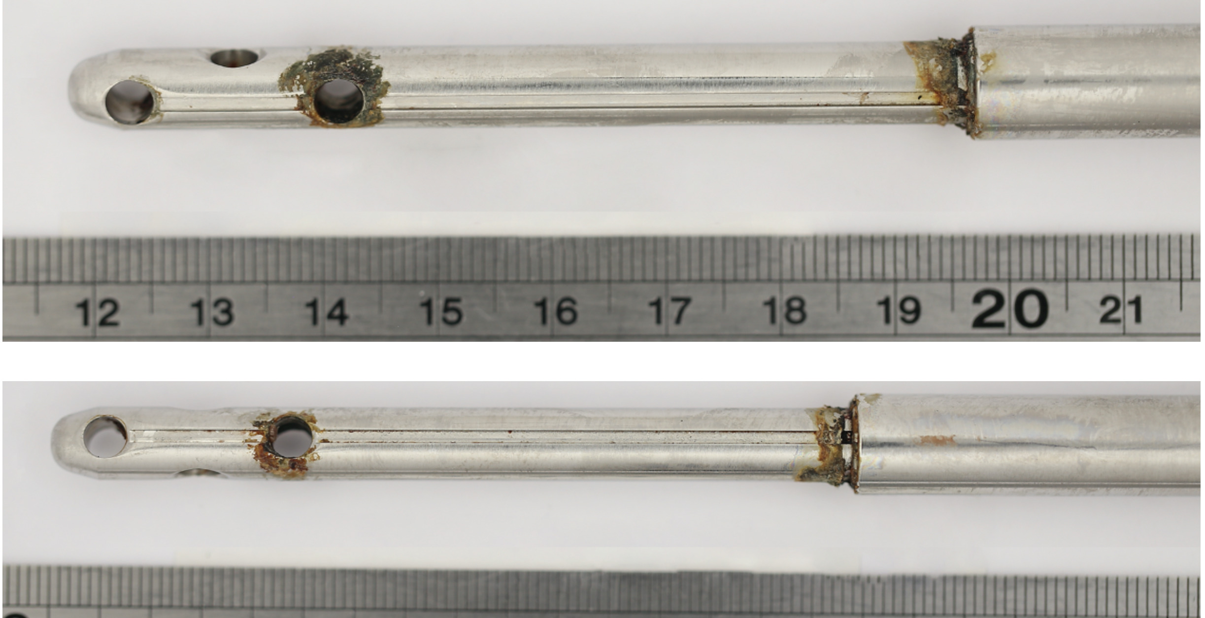 Fig. 5 
            Macroscopic images of damage patterns localized to screw holes and the extendable junction of the nails. Example shown is of the left tibial nail retrieved from Patient 1 after 11 months in situ. This patient experienced severe pain in their left tibia and there was evidence of cortical thickening around the site of the junction.
          